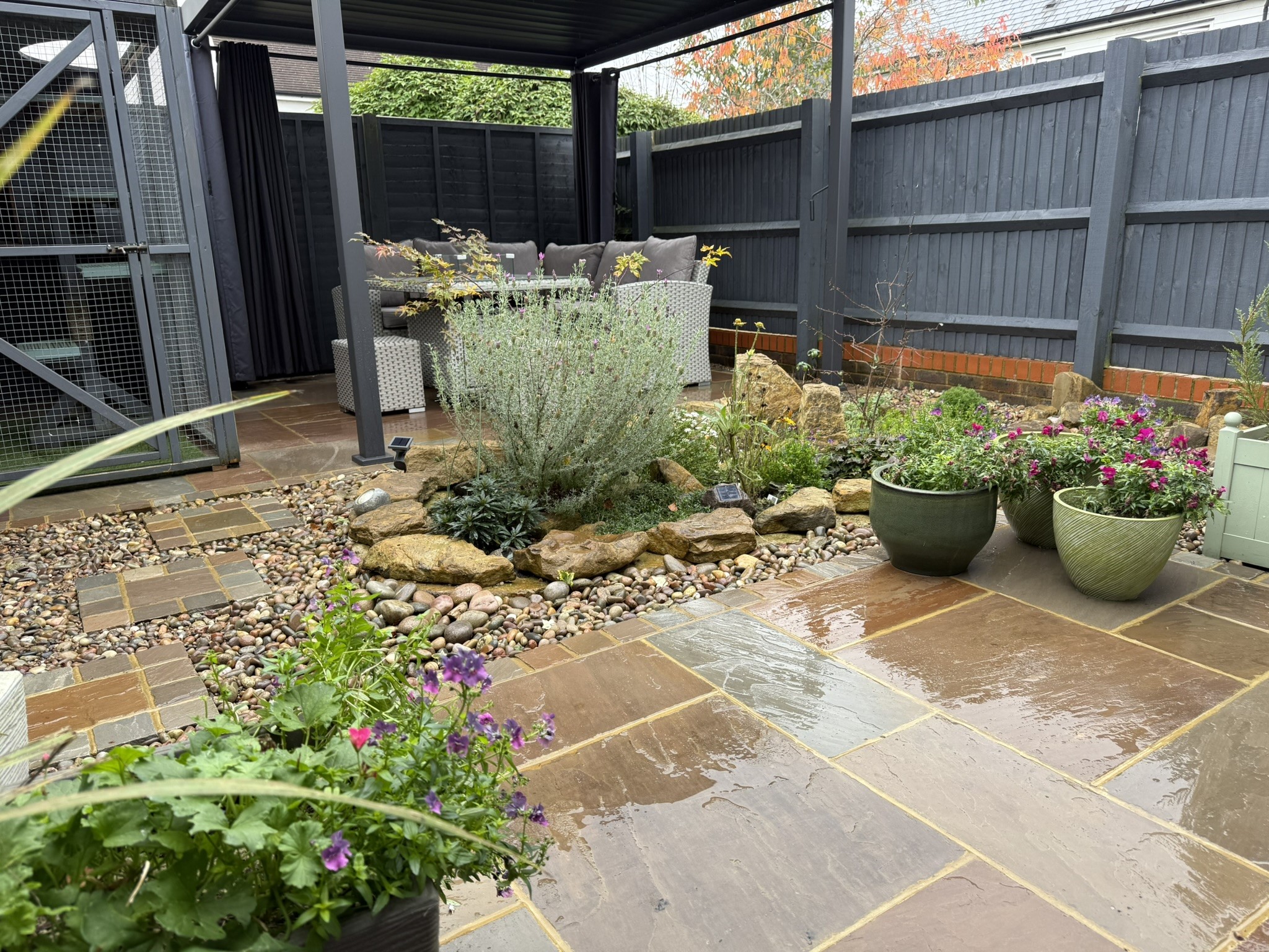 Unique Landscaping w/ with Paving Stones and Planter